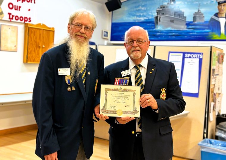 Cde Barry Smith, the president of the Bruce Shrine Club, awarded the Tara Legion with a 100 Million Dollar Certificate